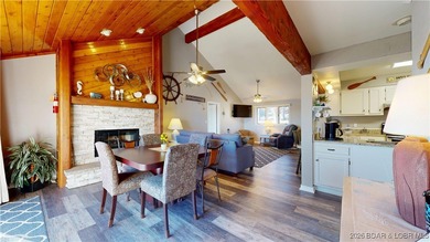 LAKE OF THE OZARKS | TOP-FLOOR CONDOMINIUM Enjoy breathtaking on The Oaks Golf Course in Missouri - for sale on GolfHomes.com, golf home, golf lot