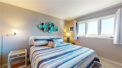 LAKE OF THE OZARKS | TOP-FLOOR CONDOMINIUM Enjoy breathtaking on The Oaks Golf Course in Missouri - for sale on GolfHomes.com, golf home, golf lot