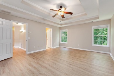 Welcome Home to this beautifully upgraded 4-bedroom, 3-bath on The Golf Club of Georgia in Georgia - for sale on GolfHomes.com, golf home, golf lot
