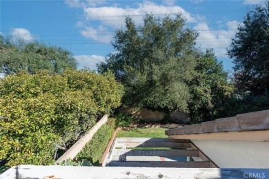 Old Orchard single story in the heart of Valencia. Tile flooring on Vista Valencia Golf Course in California - for sale on GolfHomes.com, golf home, golf lot