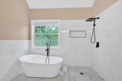 Welcome Home to this beautifully upgraded 4-bedroom, 3-bath on The Golf Club of Georgia in Georgia - for sale on GolfHomes.com, golf home, golf lot
