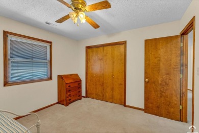 Unique open floor plan.  Living room featuring a vaulted ceiling on Alvamar Country Club in Kansas - for sale on GolfHomes.com, golf home, golf lot