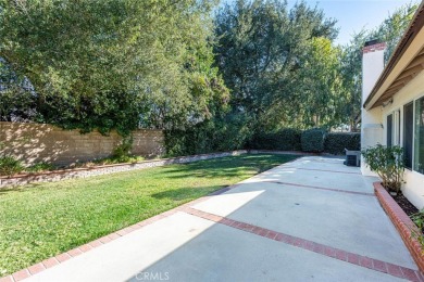 Old Orchard single story in the heart of Valencia. Tile flooring on Vista Valencia Golf Course in California - for sale on GolfHomes.com, golf home, golf lot