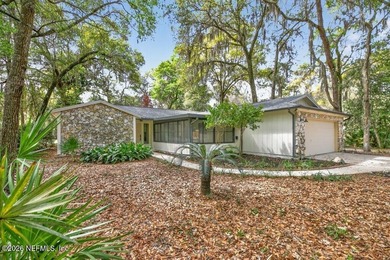 12128 Hidden Hills Drive Welcome to life inside the gated Hidden on Hidden Hills Country Club in Florida - for sale on GolfHomes.com, golf home, golf lot