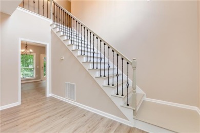 Welcome Home to this beautifully upgraded 4-bedroom, 3-bath on The Golf Club of Georgia in Georgia - for sale on GolfHomes.com, golf home, golf lot