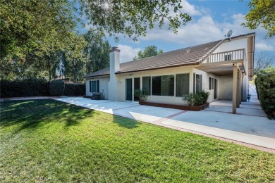 Old Orchard single story in the heart of Valencia. Tile flooring on Vista Valencia Golf Course in California - for sale on GolfHomes.com, golf home, golf lot