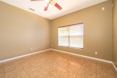 One or more photo(s) has been virtually staged. One or more on Oaks National Golf Course in Florida - for sale on GolfHomes.com, golf home, golf lot