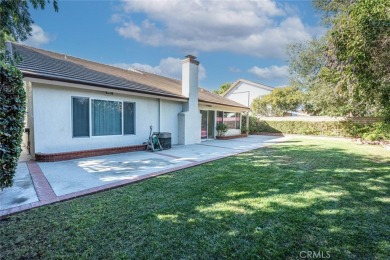 Old Orchard single story in the heart of Valencia. Tile flooring on Vista Valencia Golf Course in California - for sale on GolfHomes.com, golf home, golf lot