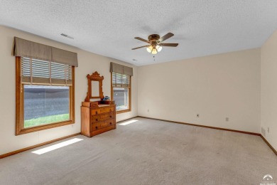 Unique open floor plan.  Living room featuring a vaulted ceiling on Alvamar Country Club in Kansas - for sale on GolfHomes.com, golf home, golf lot