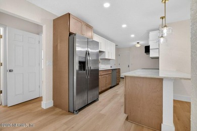 12128 Hidden Hills Drive Welcome to life inside the gated Hidden on Hidden Hills Country Club in Florida - for sale on GolfHomes.com, golf home, golf lot