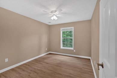 Welcome Home to this beautifully upgraded 4-bedroom, 3-bath on The Golf Club of Georgia in Georgia - for sale on GolfHomes.com, golf home, golf lot
