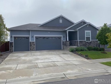 Beautiful ranch-style home backing to greenbelt in Windsor's on Raindance National Golf Course in Colorado - for sale on GolfHomes.com, golf home, golf lot