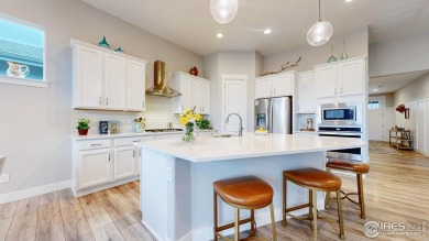 Beautiful ranch-style home backing to greenbelt in Windsor's on Raindance National Golf Course in Colorado - for sale on GolfHomes.com, golf home, golf lot