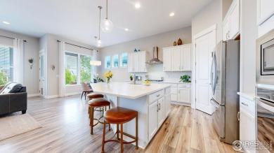 Beautiful ranch-style home backing to greenbelt in Windsor's on Raindance National Golf Course in Colorado - for sale on GolfHomes.com, golf home, golf lot