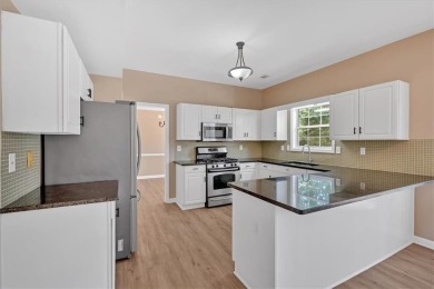Welcome Home to this beautifully upgraded 4-bedroom, 3-bath on The Golf Club of Georgia in Georgia - for sale on GolfHomes.com, golf home, golf lot