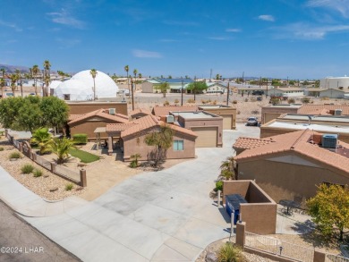 The perfect set up! Beautiful condo with an oversized, 2 car on London Bridge Golf Course in Arizona - for sale on GolfHomes.com, golf home, golf lot