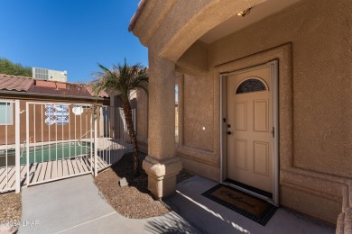 The perfect set up! Beautiful condo with an oversized, 2 car on London Bridge Golf Course in Arizona - for sale on GolfHomes.com, golf home, golf lot