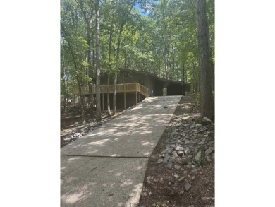 UPDATED: 2 bed 2 bath plus office. New roof, flooring, cabinets on Cortez Golf Course in Arkansas - for sale on GolfHomes.com, golf home, golf lot