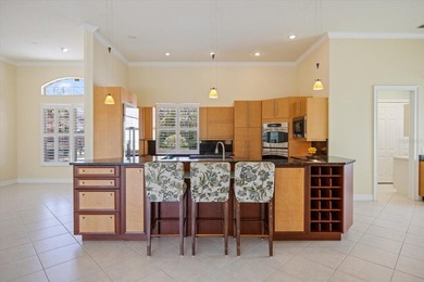 One or more photo(s) has been virtually staged. Tucked within on Boca Royale Golf and Country Club in Florida - for sale on GolfHomes.com, golf home, golf lot