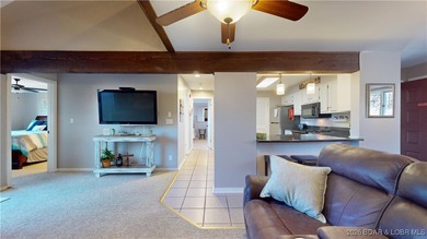 LAKE OF THE OZARKS | TOP-FLOOR CONDOMINIUM Enjoy breathtaking on The Oaks Golf Course in Missouri - for sale on GolfHomes.com, golf home, golf lot