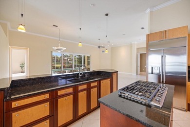 One or more photo(s) has been virtually staged. Tucked within on Boca Royale Golf and Country Club in Florida - for sale on GolfHomes.com, golf home, golf lot