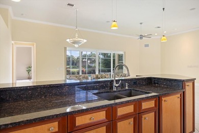 One or more photo(s) has been virtually staged. Tucked within on Boca Royale Golf and Country Club in Florida - for sale on GolfHomes.com, golf home, golf lot