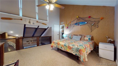 LAKE OF THE OZARKS | TOP-FLOOR CONDOMINIUM Enjoy breathtaking on The Oaks Golf Course in Missouri - for sale on GolfHomes.com, golf home, golf lot