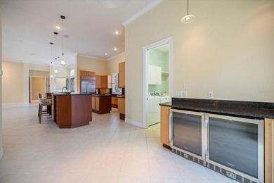 One or more photo(s) has been virtually staged. Tucked within on Boca Royale Golf and Country Club in Florida - for sale on GolfHomes.com, golf home, golf lot