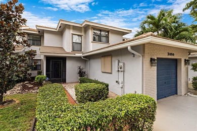 Welcome to the South Florida lifestyle.  Sweeping lake views on Deer Creek Golf Club in Florida - for sale on GolfHomes.com, golf home, golf lot