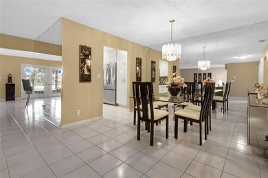 Welcome to the South Florida lifestyle.  Sweeping lake views on Deer Creek Golf Club in Florida - for sale on GolfHomes.com, golf home, golf lot