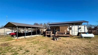 Discover the ultimate Lake Fork retreat with this fully fenced on Links At Lands End in Texas - for sale on GolfHomes.com, golf home, golf lot