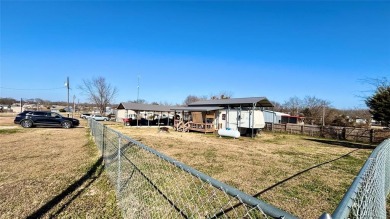 Discover the ultimate Lake Fork retreat with this fully fenced on Links At Lands End in Texas - for sale on GolfHomes.com, golf home, golf lot