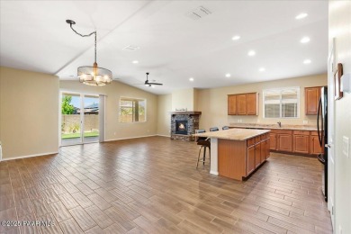 Discover comfort and functionality in this inviting home on Antelope Hills Golf Courses in Arizona - for sale on GolfHomes.com, golf home, golf lot