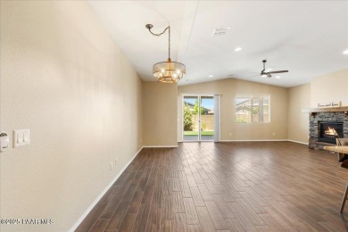 Discover comfort and functionality in this inviting home on Antelope Hills Golf Courses in Arizona - for sale on GolfHomes.com, golf home, golf lot