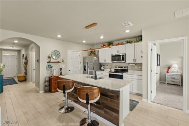 This beautifully upgraded 3-bedroom, 2-bath home is just one on Herons Glen Golf and Country Club in Florida - for sale on GolfHomes.com, golf home, golf lot