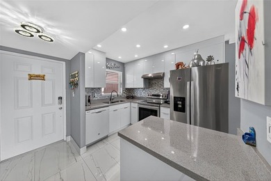 Beautifully renovated 2-bed, 2-bath condo located in the on Sunrise Lakes Phase III in Florida - for sale on GolfHomes.com, golf home, golf lot