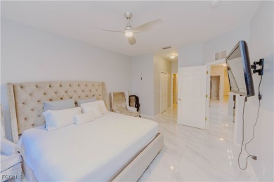 Cornered 3 bedroom/2 bath condo unit. New tile flooring on Majestic Golf Club in Florida - for sale on GolfHomes.com, golf home, golf lot