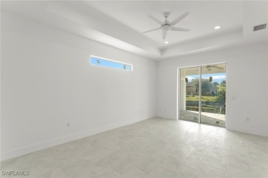 WATERFRONT NEW CONSTRUCTION HOME comes loaded with upgrades on Coral Oaks Golf Course in Florida - for sale on GolfHomes.com, golf home, golf lot