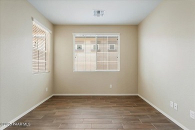 Discover comfort and functionality in this inviting home on Antelope Hills Golf Courses in Arizona - for sale on GolfHomes.com, golf home, golf lot