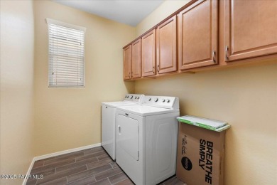 Discover comfort and functionality in this inviting home on Antelope Hills Golf Courses in Arizona - for sale on GolfHomes.com, golf home, golf lot