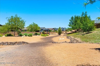 Discover comfort and functionality in this inviting home on Antelope Hills Golf Courses in Arizona - for sale on GolfHomes.com, golf home, golf lot