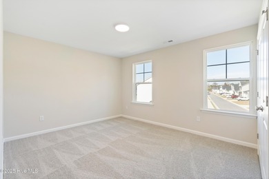 Experience the brand new Belton plan, now available in Bell on Green Hills Golf Course in North Carolina - for sale on GolfHomes.com, golf home, golf lot