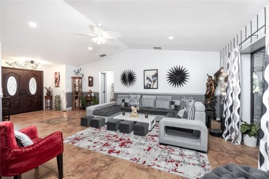 Experience the ultimate Florida lifestyle in this stunning home on Rotonda Golf and Country Club The Palms Course in Florida - for sale on GolfHomes.com, golf home, golf lot