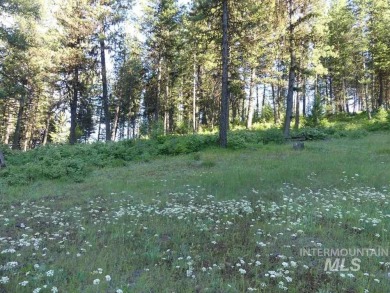 Nicely wooded lot with views to the west. Driveway is shared for on Meadowcreek Golf Resort in Idaho - for sale on GolfHomes.com, golf home, golf lot