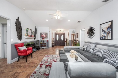 Experience the ultimate Florida lifestyle in this stunning home on Rotonda Golf and Country Club The Palms Course in Florida - for sale on GolfHomes.com, golf home, golf lot