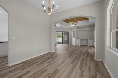 Discover the perfect blend of comfort, elegance, and on Southern Woods Golf Club in Florida - for sale on GolfHomes.com, golf home, golf lot