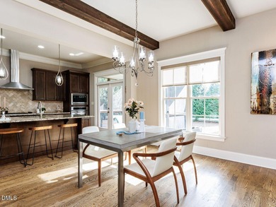 Main Floor Primary & In-Law Suite: Nestled beautifully among the on Heritage Golf Club in North Carolina - for sale on GolfHomes.com, golf home, golf lot