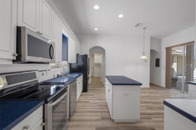 Discover the perfect blend of comfort, elegance, and on Southern Woods Golf Club in Florida - for sale on GolfHomes.com, golf home, golf lot