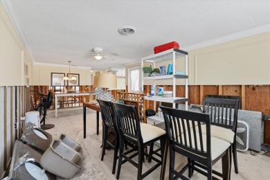 Under contract-accepting backup offers. LOWEST PRICED SFR on Key Royale Club in Florida - for sale on GolfHomes.com, golf home, golf lot