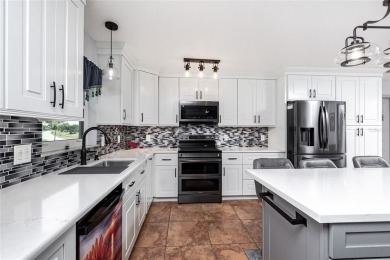 Experience the ultimate Florida lifestyle in this stunning home on Rotonda Golf and Country Club The Palms Course in Florida - for sale on GolfHomes.com, golf home, golf lot
